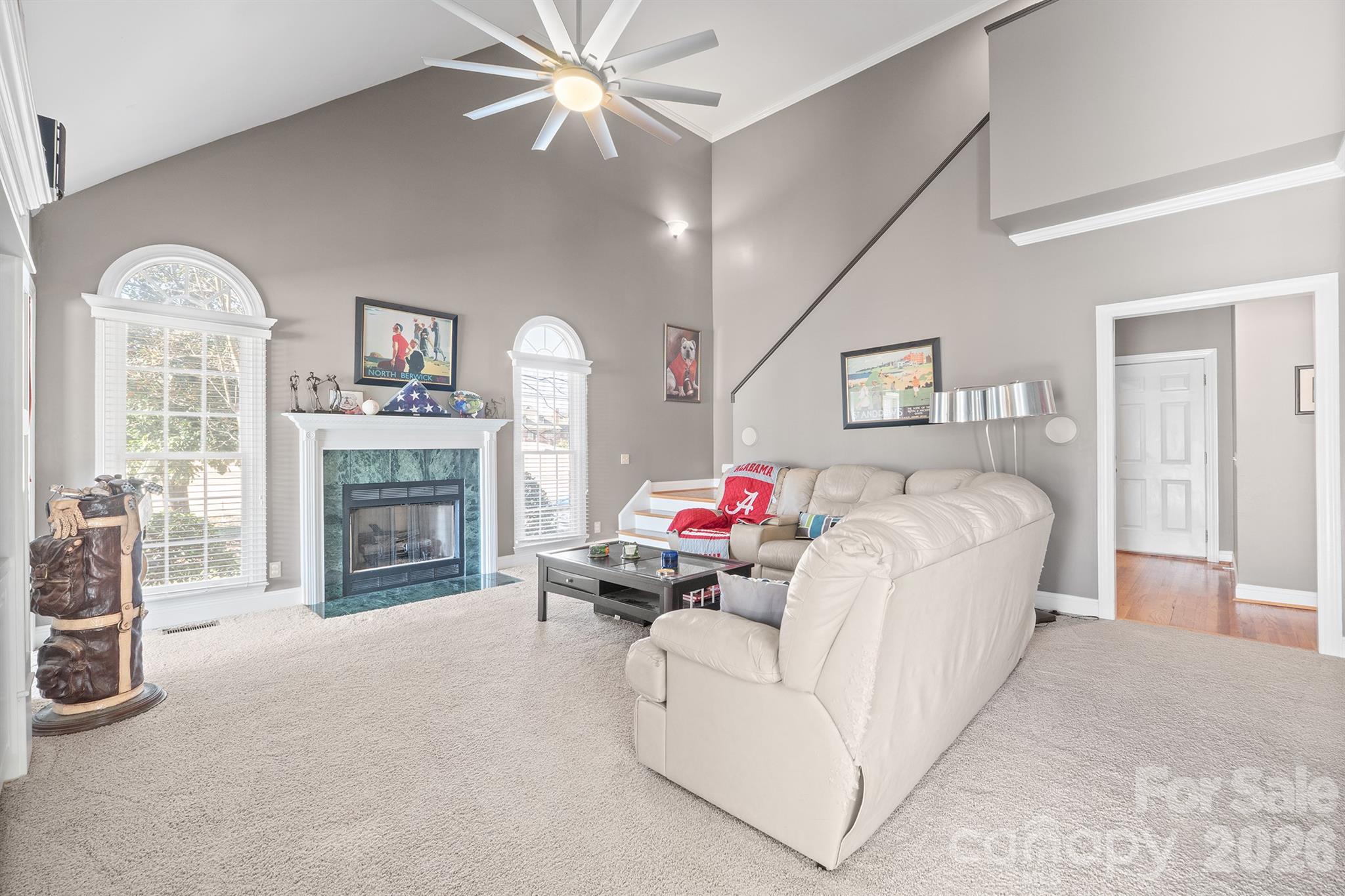 2425 Birdie Lane Northeast Conover, NC 28613 - Photo 21 of 43 a living room with furniture and a fireplace
