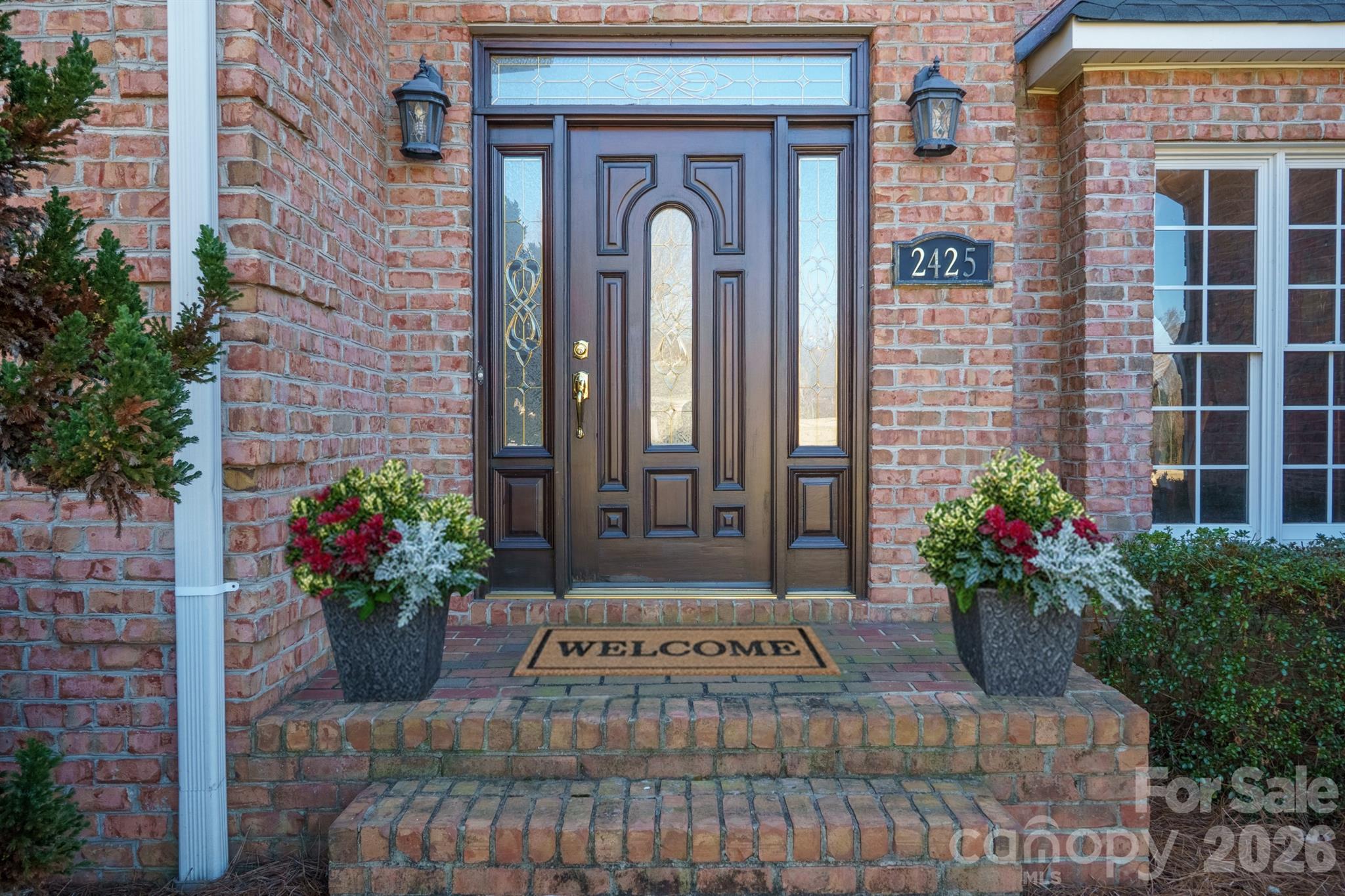 2425 Birdie Lane Northeast Conover, NC 28613 - Photo 3 of 43 a front view of a house with a garden