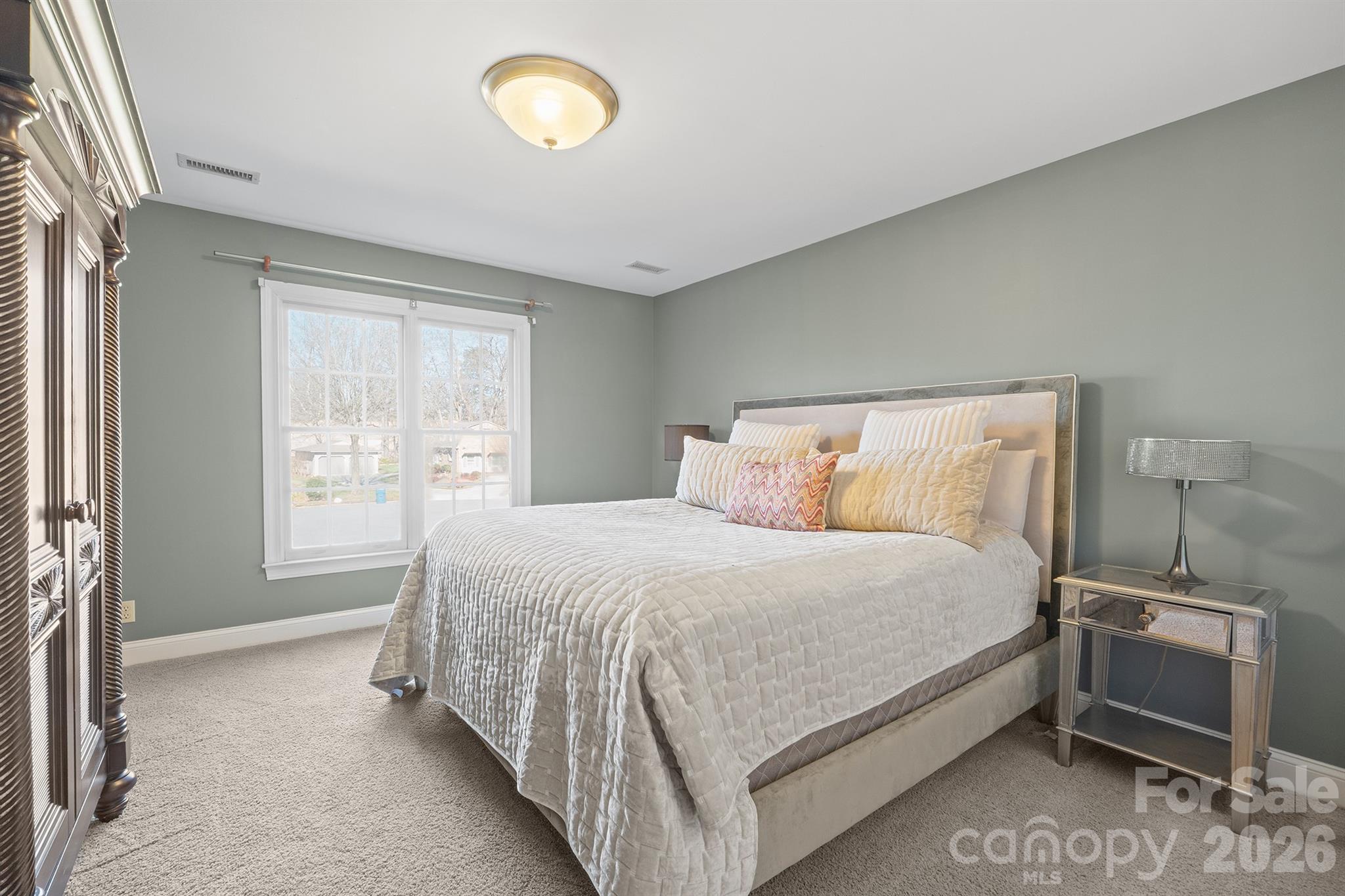 2425 Birdie Lane Northeast Conover, NC 28613 - Photo 36 of 43 a bedroom with a bed and a window