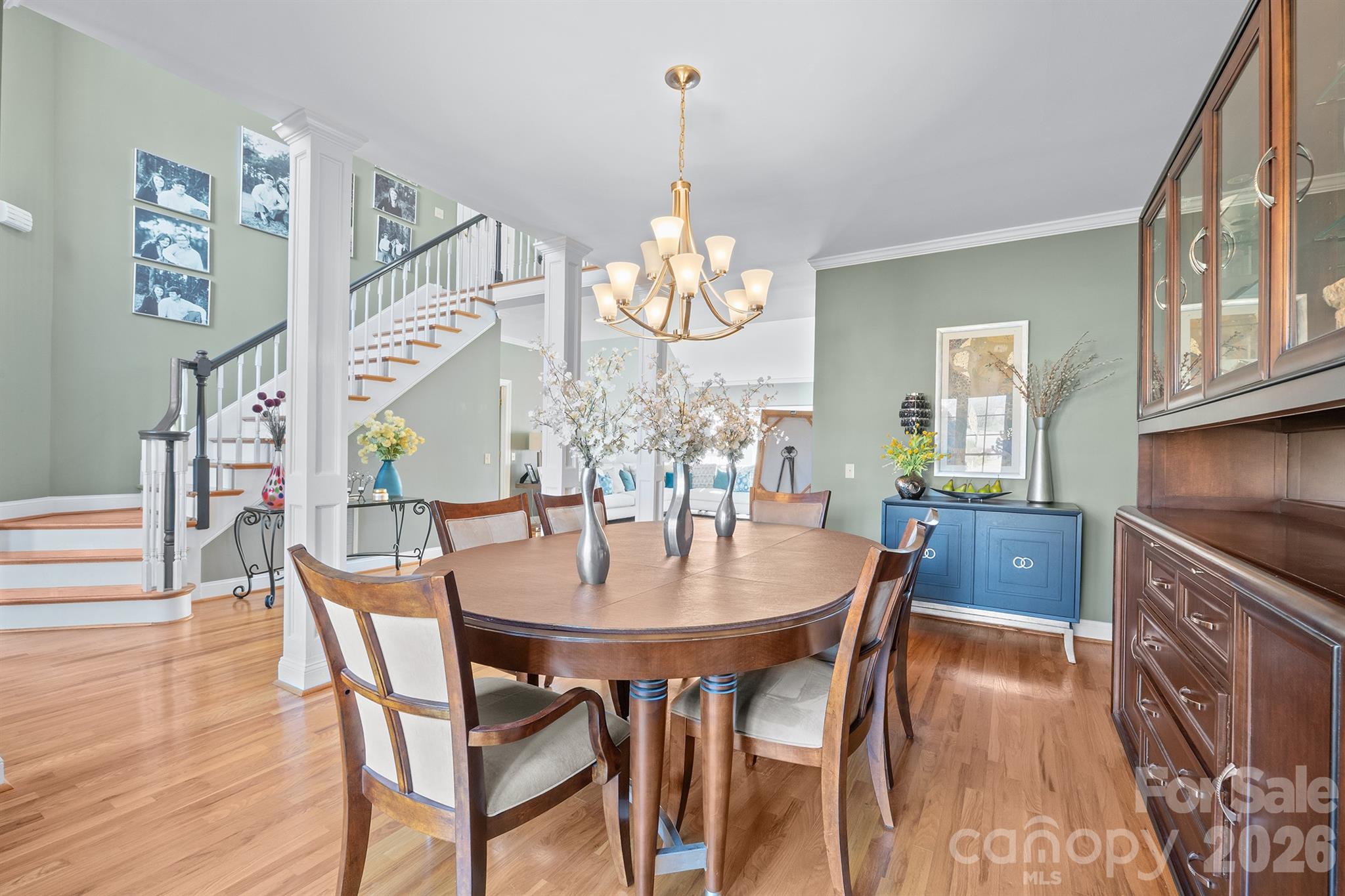 2425 Birdie Lane Northeast Conover, NC 28613 - Photo 8 of 43 a view of a dining room with furniture and wooden floor
