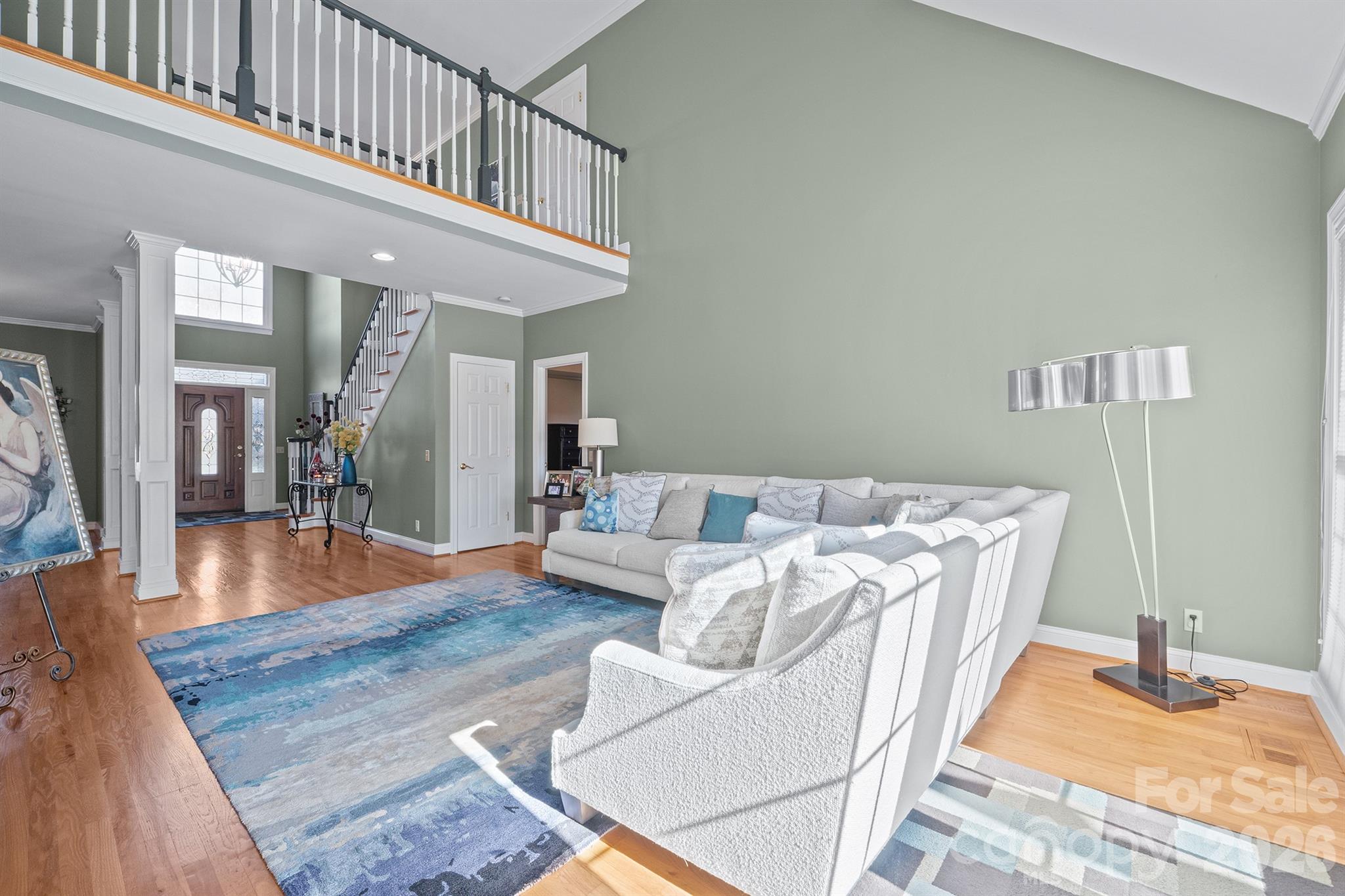 2425 Birdie Lane Northeast Conover, NC 28613 - Photo 10 of 43 a living room with furniture and a wooden floor