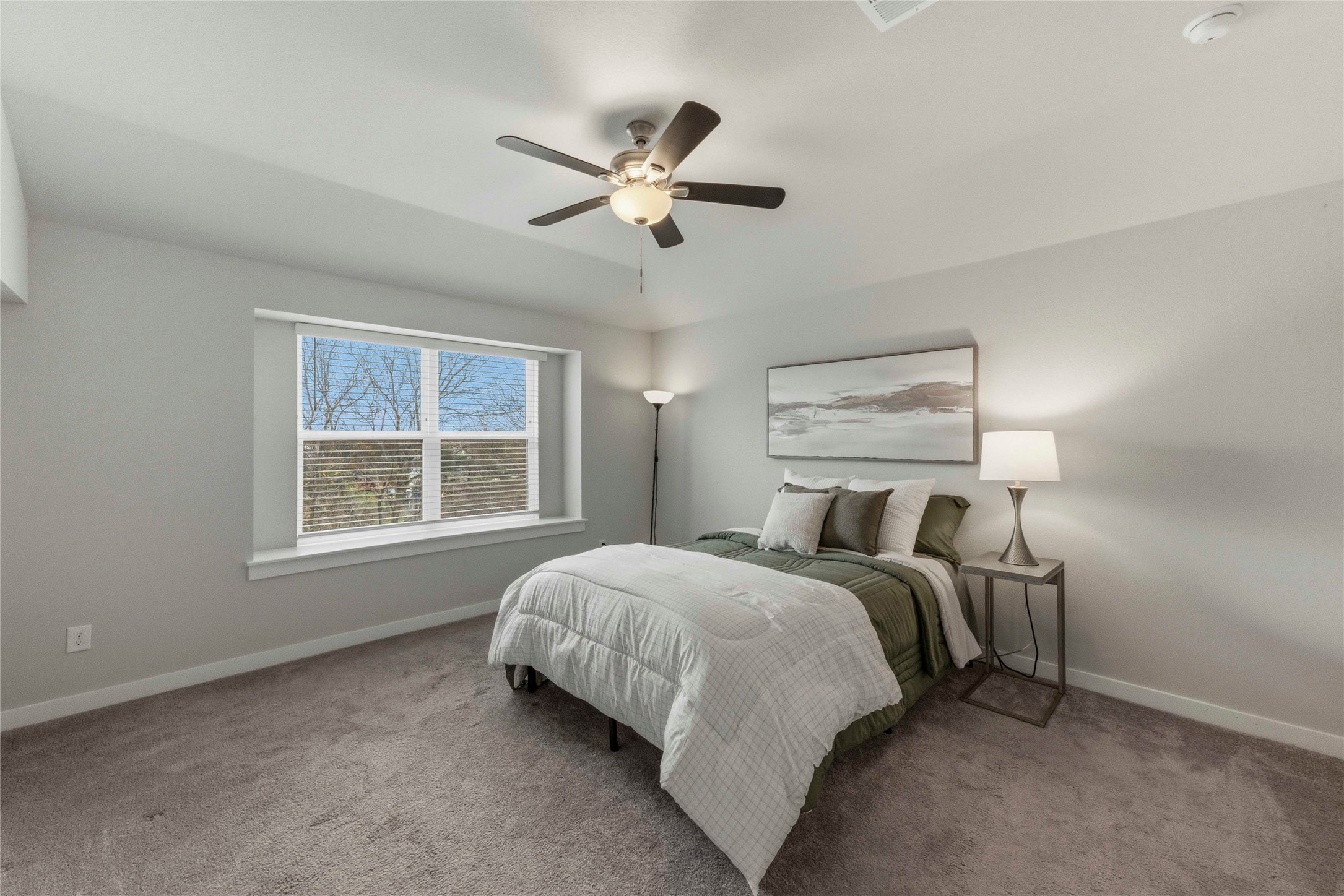 17203 Leafroller Drive, Unit B Pflugerville, TX 78660 - Photo 12 of 20 a bedroom with a bed and window