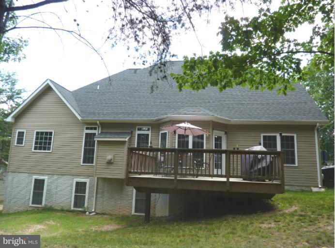 168 Holiday Road Cross Junction, VA 22625 - Photo 4 of 29 a front view of a house with yard and porch
