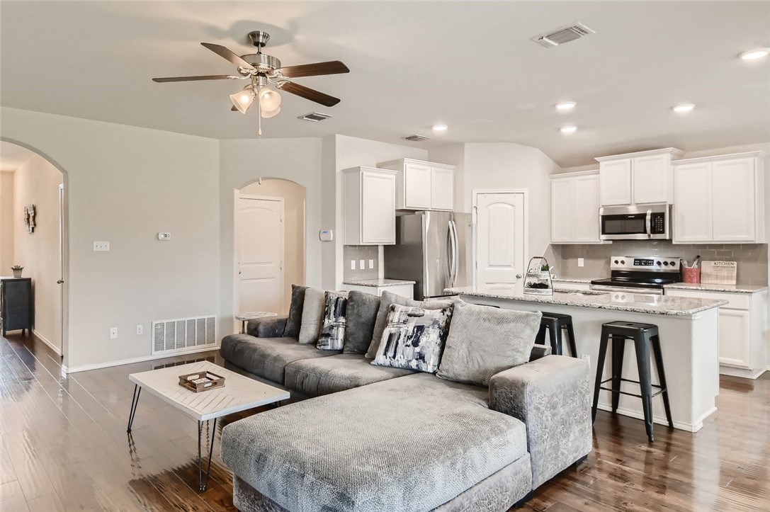 129 Hematite Lane Jarrell, TX 76537 - Photo 1 of 1 a living room with furniture kitchen and a dining table
