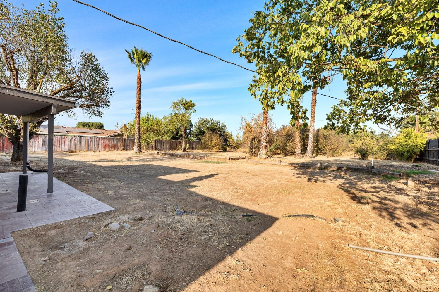17153 Rodeo Drive Madera, CA 93638 - Photo 21 of 22 a view of outdoor space with trees