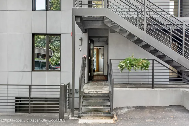 a view of a backyard with a patio