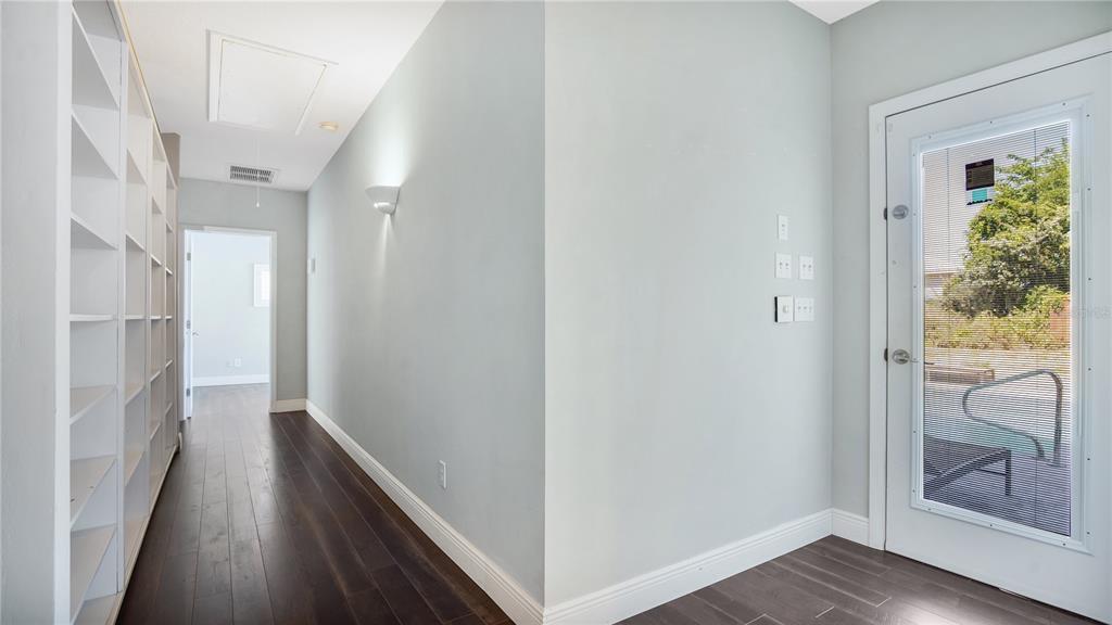 207 Hubbell Street Edgewater, FL 32132 - Photo 26 of 46 hallway to primary Suite