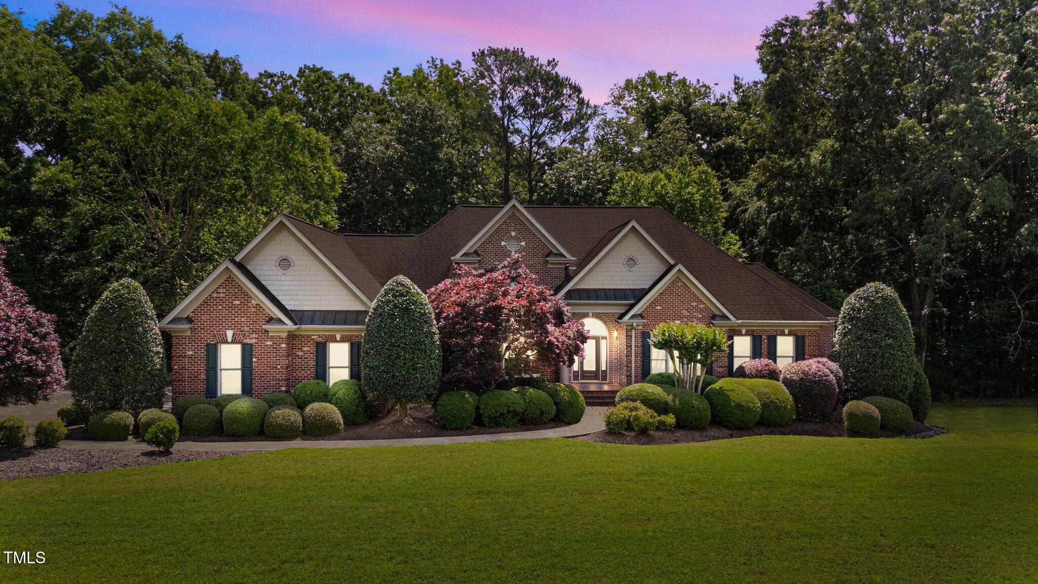 12504 Bayleaf Church Road Raleigh, NC 27614 - Photo 1 of 73 a front view of a house with a yard