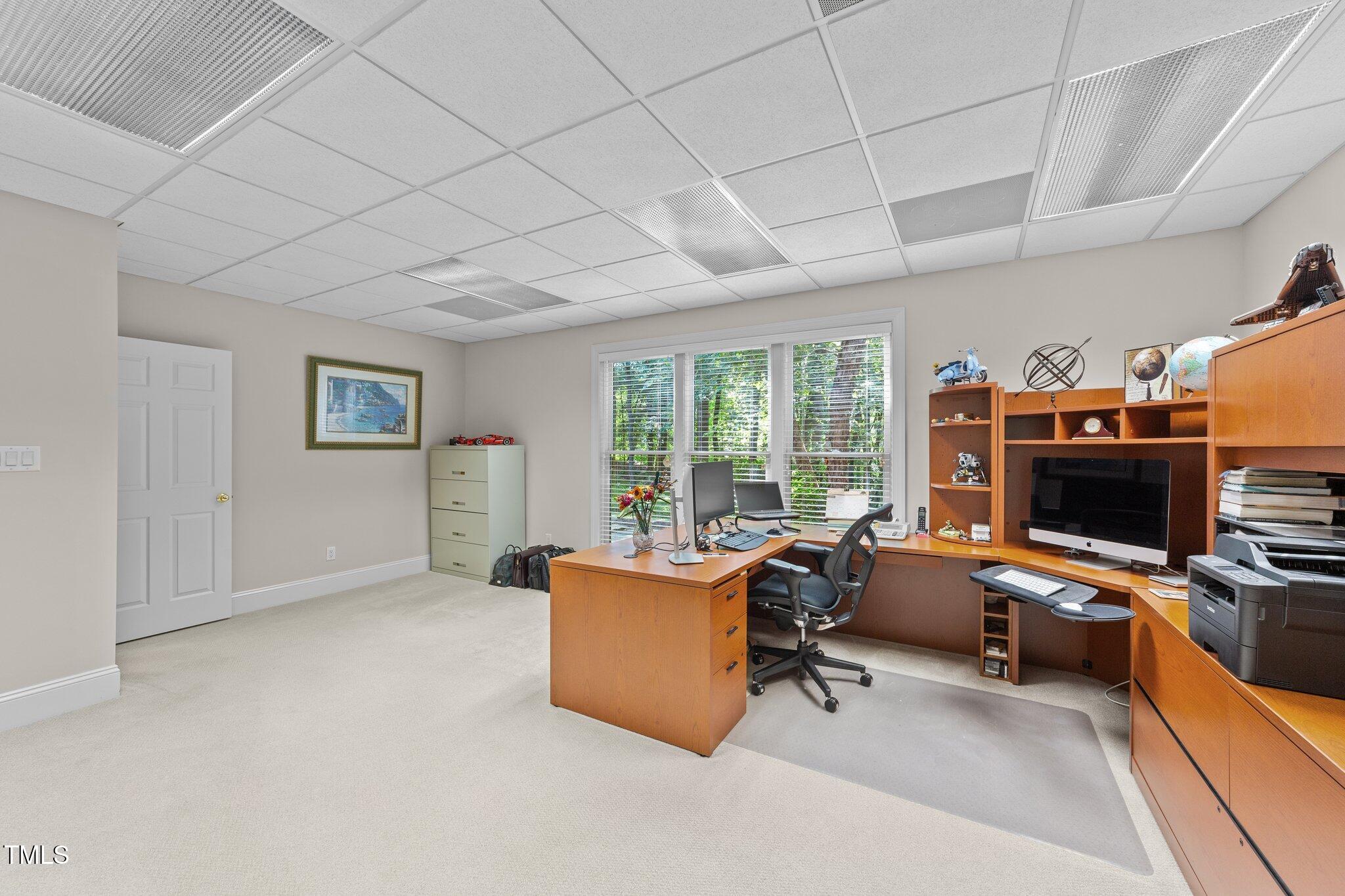 12504 Bayleaf Church Road Raleigh, NC 27614 - Photo 49 of 73 a view of a livingroom with workspace and a window
