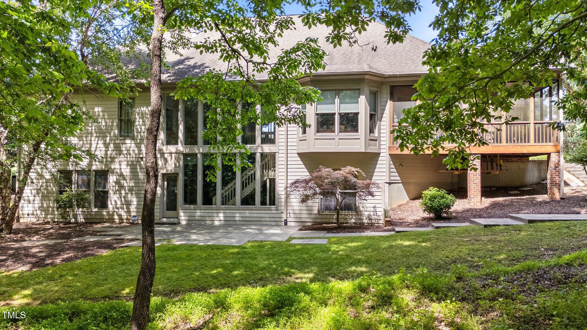 12504 Bayleaf Church Road Raleigh, NC 27614 - Photo 59 of 73 a view of a house with backyard and a tree