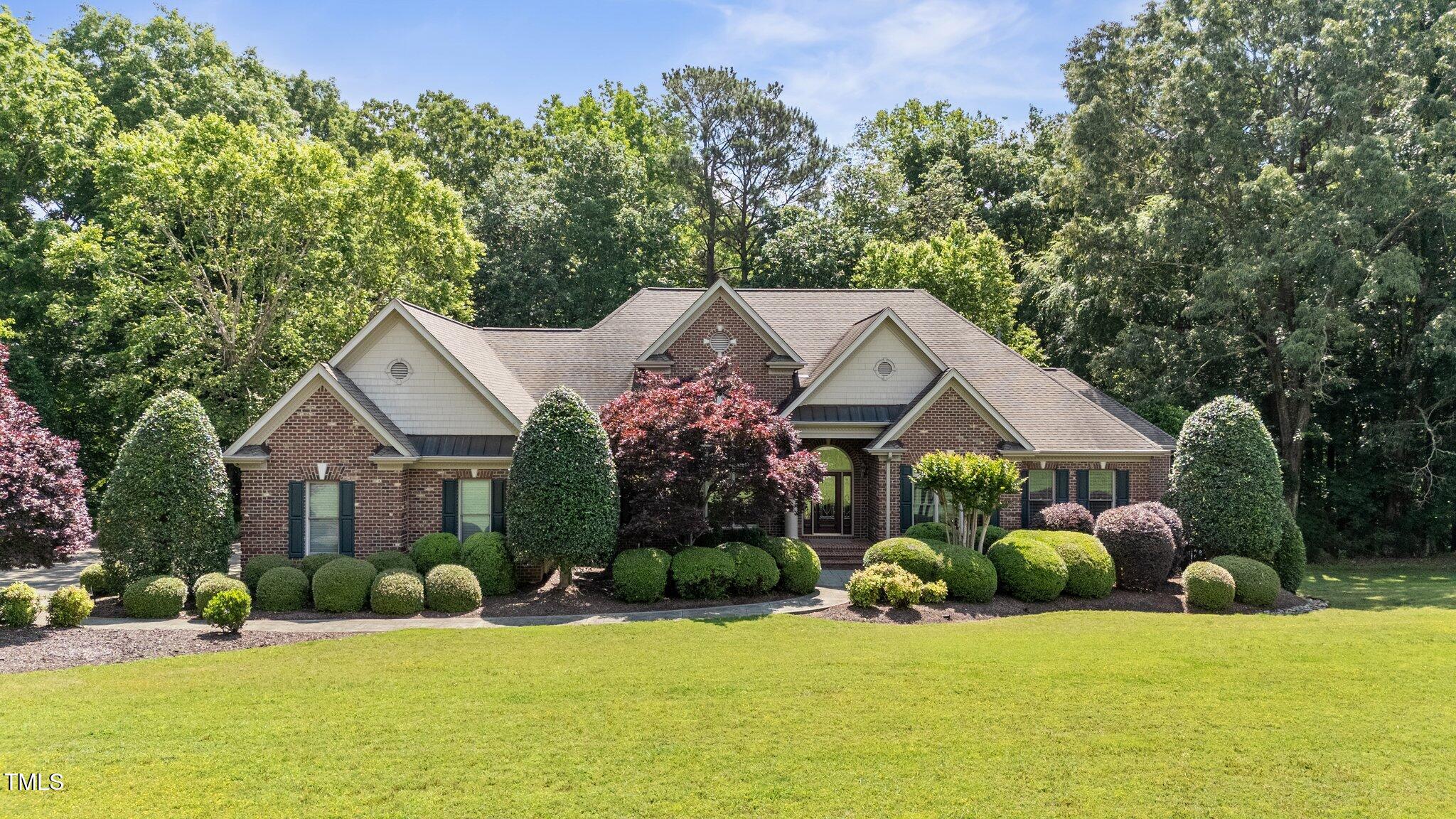 12504 Bayleaf Church Road Raleigh, NC 27614 - Photo 62 of 73 a front view of house with yard and green space
