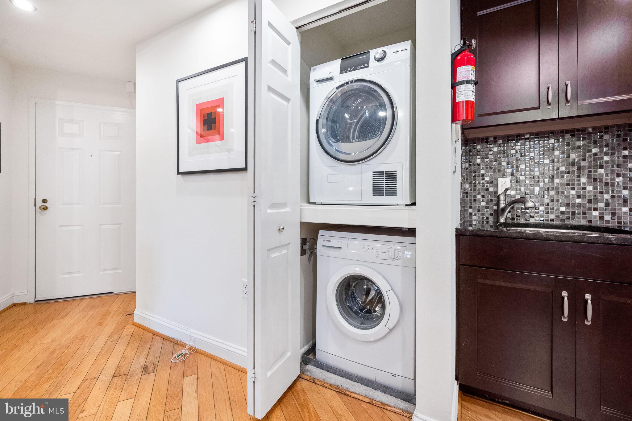 1621 T Street Northwest, Unit 207 Washington, DC 20009 - Photo 18 of 29 a utility room with dryer and washer