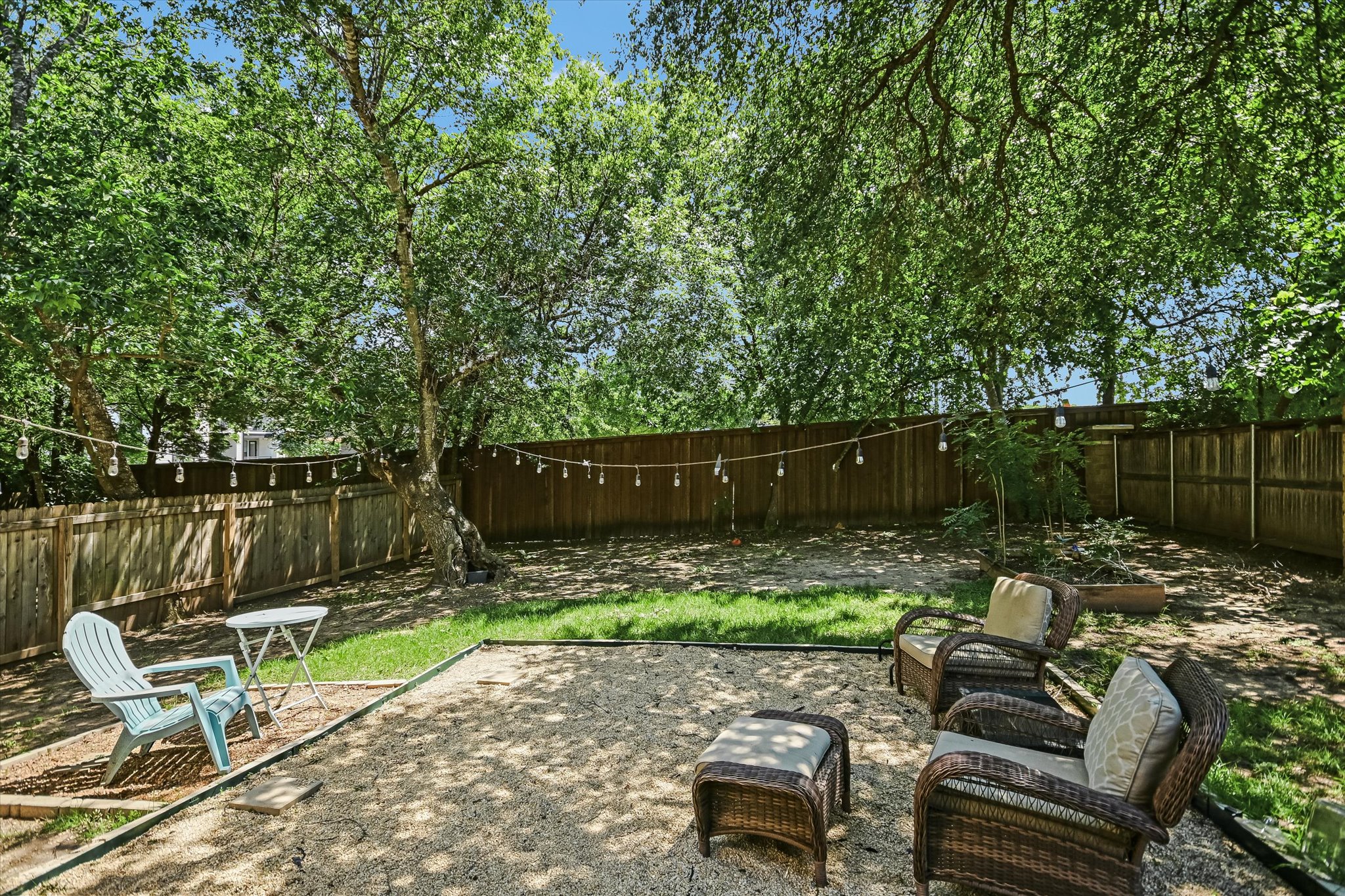 7709 Menchaca Road, Unit 1 Austin, TX 78745 - Photo 2 of 29 Spacious fenced backyard perfect for outdoor gatherings and for pets!