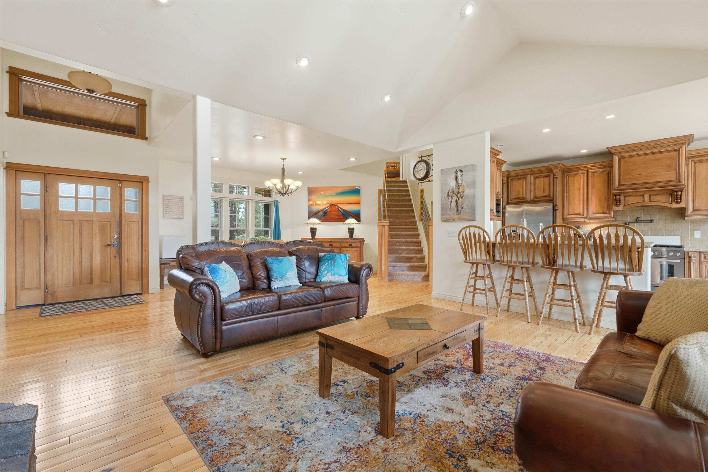 17179 Island Loop Way Bend, OR 97707 - Photo 10 of 52 a living room with furniture and a large window