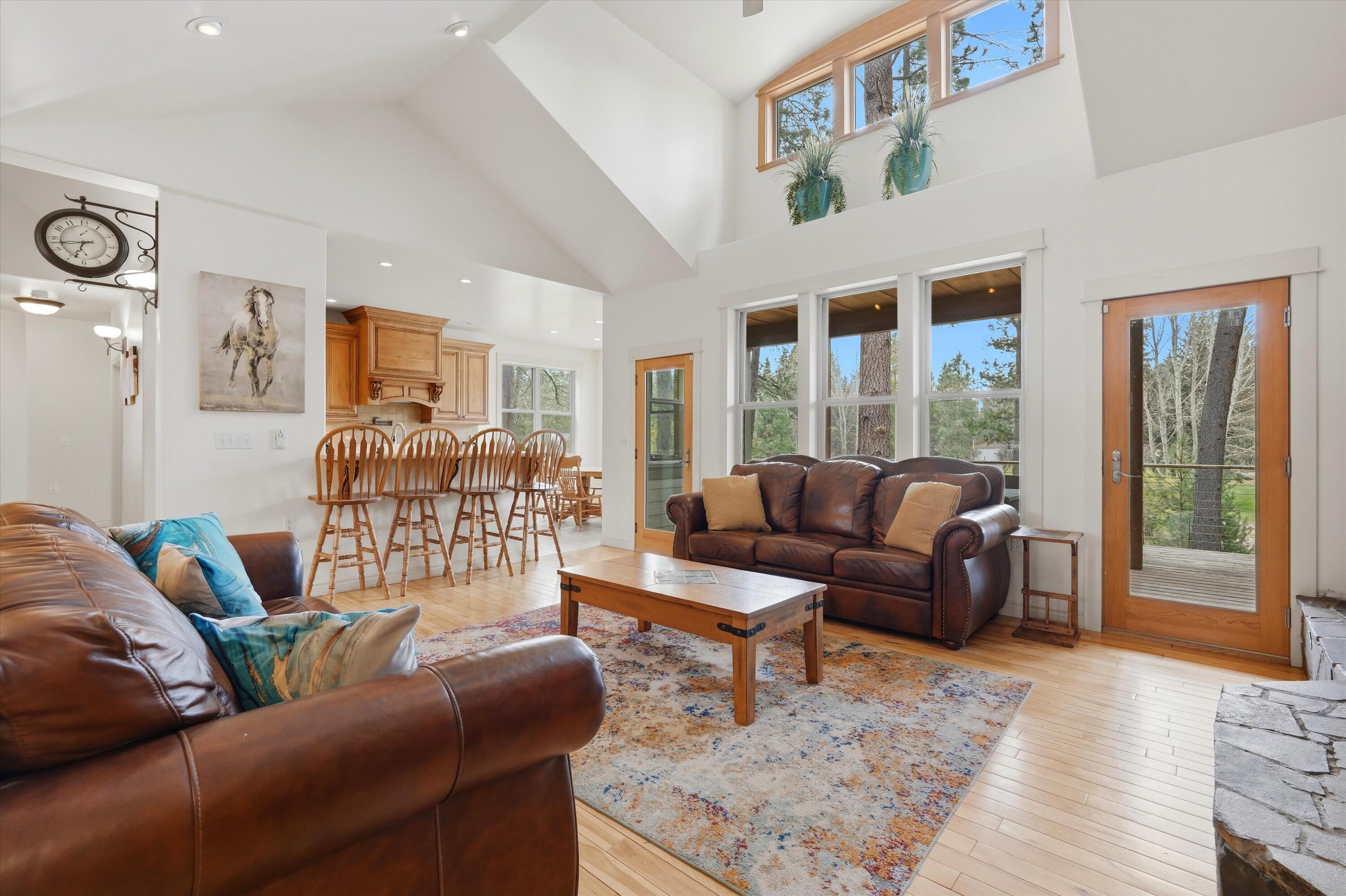 17179 Island Loop Way Bend, OR 97707 - Photo 11 of 52 a living room with furniture and a rug