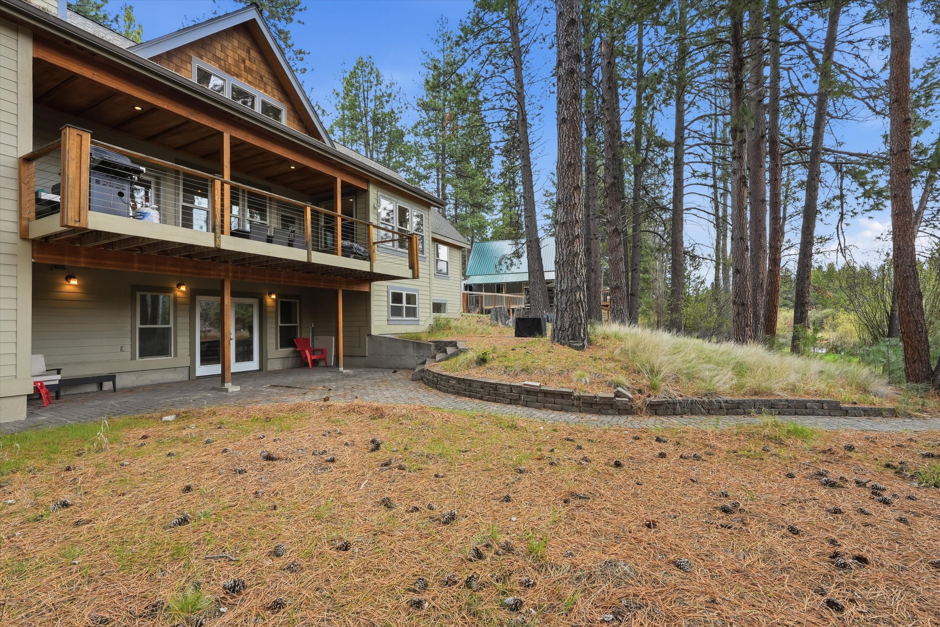17179 Island Loop Way Bend, OR 97707 - Photo 39 of 52 a view of a house with a yard
