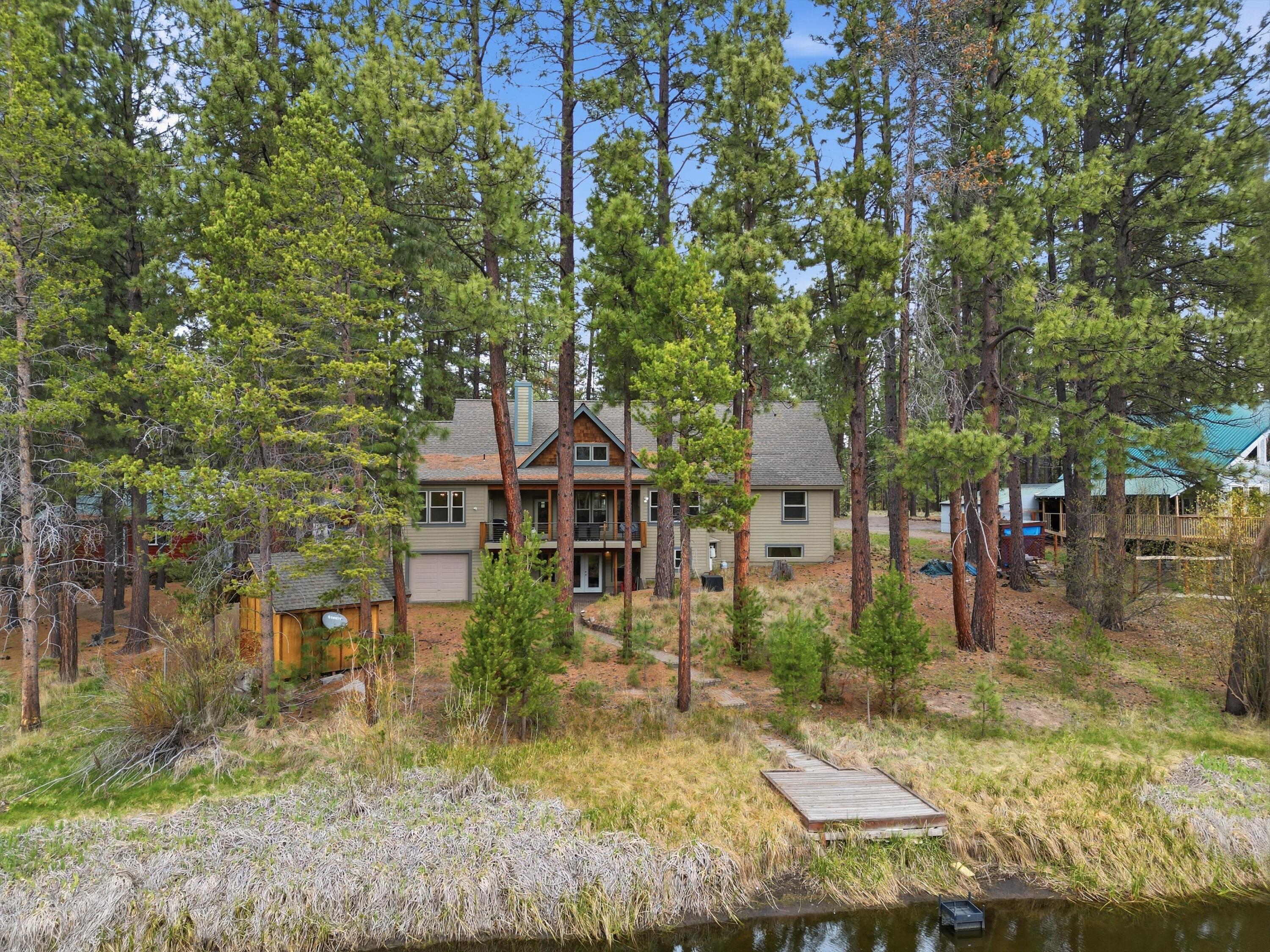 17179 Island Loop Way Bend, OR 97707 - Photo 42 of 52 front view of a house with a tree