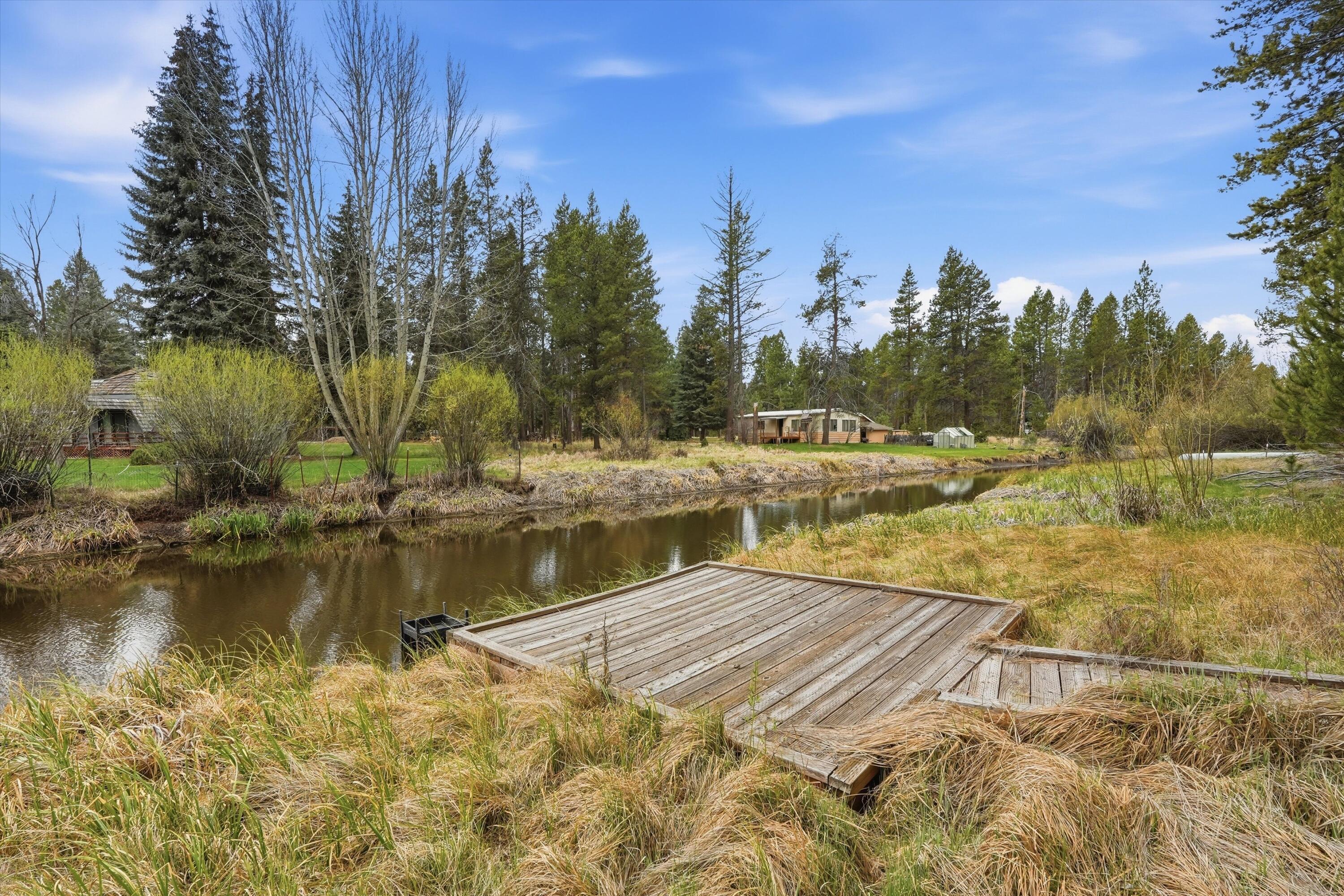 17179 Island Loop Way Bend, OR 97707 - Photo 44 of 52 a view of a lake with houses