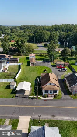 a view of yard with outdoor seating