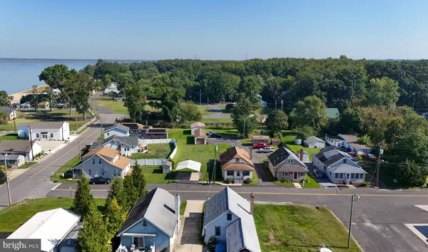 an aerial view of a house with a garden