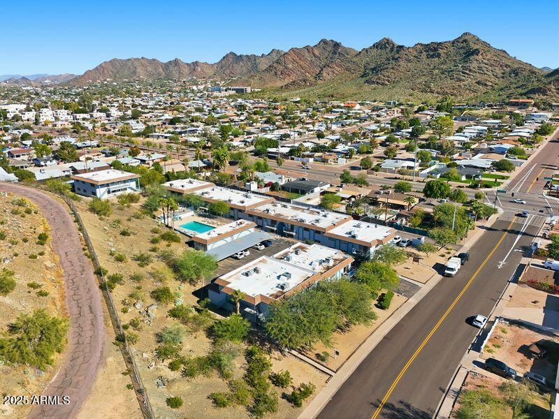 1130 East Butler Drive, Unit A1 Phoenix, AZ 85020 - Photo 19 of 31 an aerial view of residential houses with outdoor space