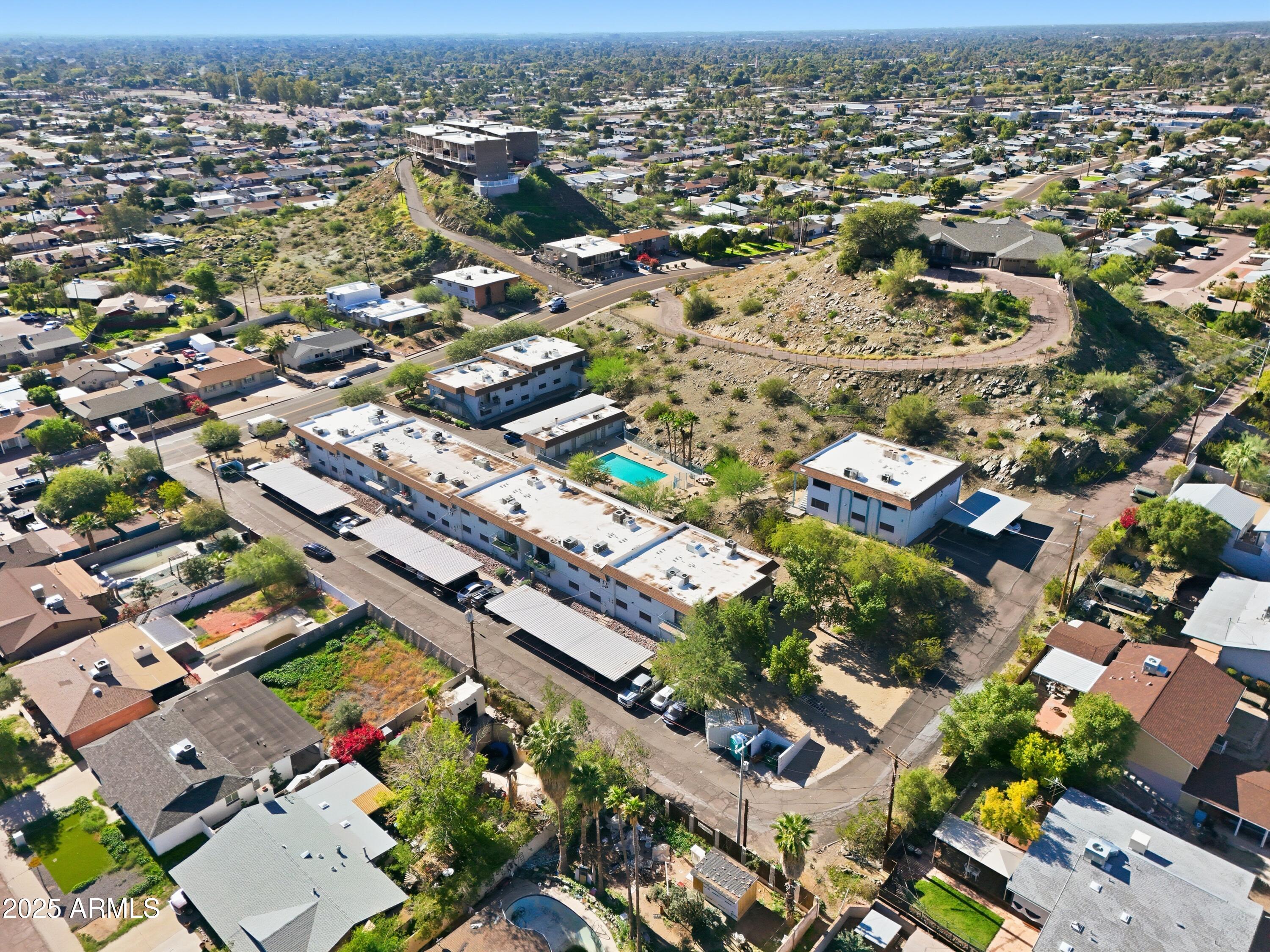 1130 East Butler Drive, Unit A1 Phoenix, AZ 85020 - Photo 21 of 31 an aerial view of a city with lots of residential buildings