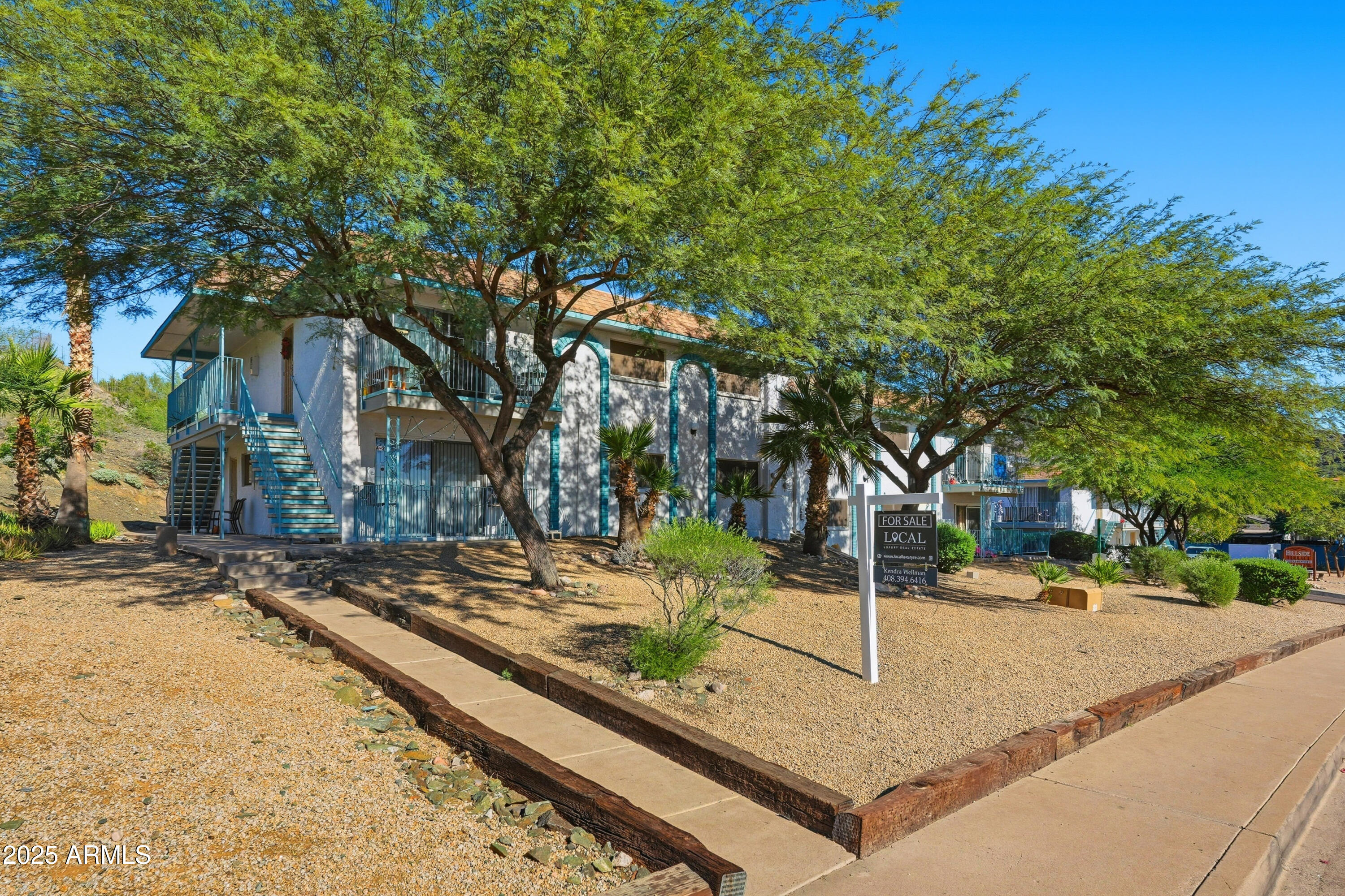 1130 East Butler Drive, Unit A1 Phoenix, AZ 85020 - Photo 24 of 31 a street view with large trees