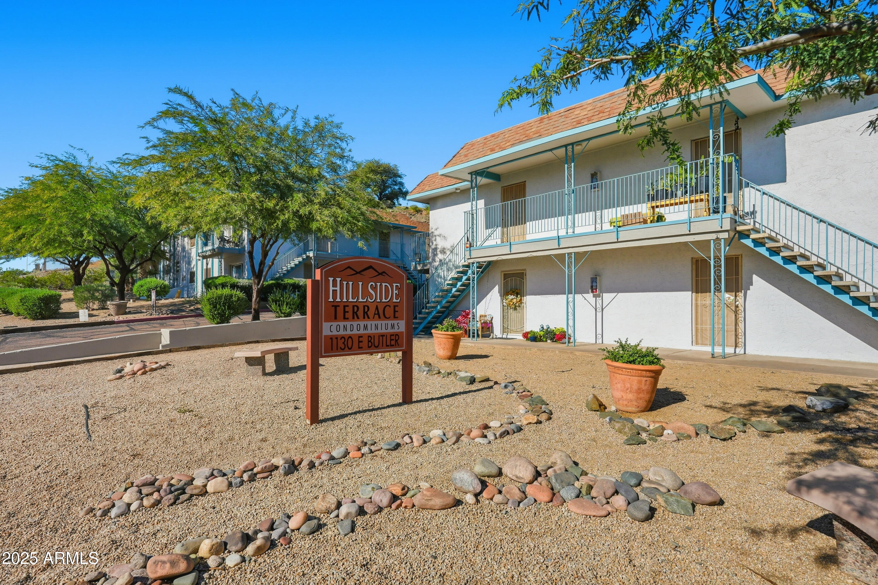 1130 East Butler Drive, Unit A1 Phoenix, AZ 85020 - Photo 27 of 31 a view of a street with wooden fence