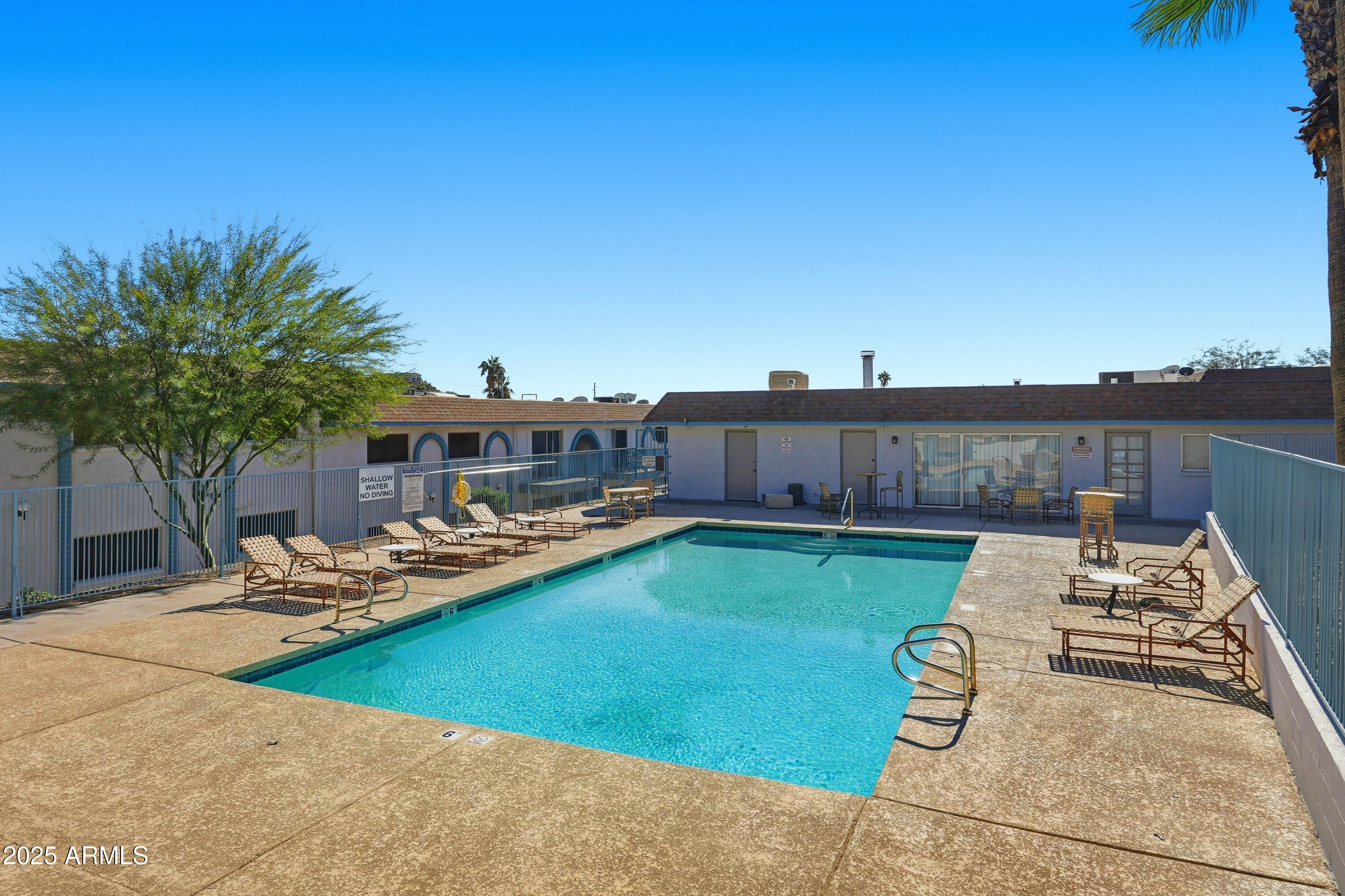 1130 East Butler Drive, Unit A1 Phoenix, AZ 85020 - Photo 31 of 31 a view of a backyard with sitting area