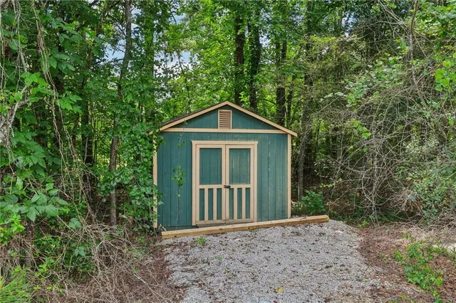 a aerial view of a house with a big yard