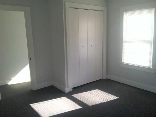 an empty room with a window