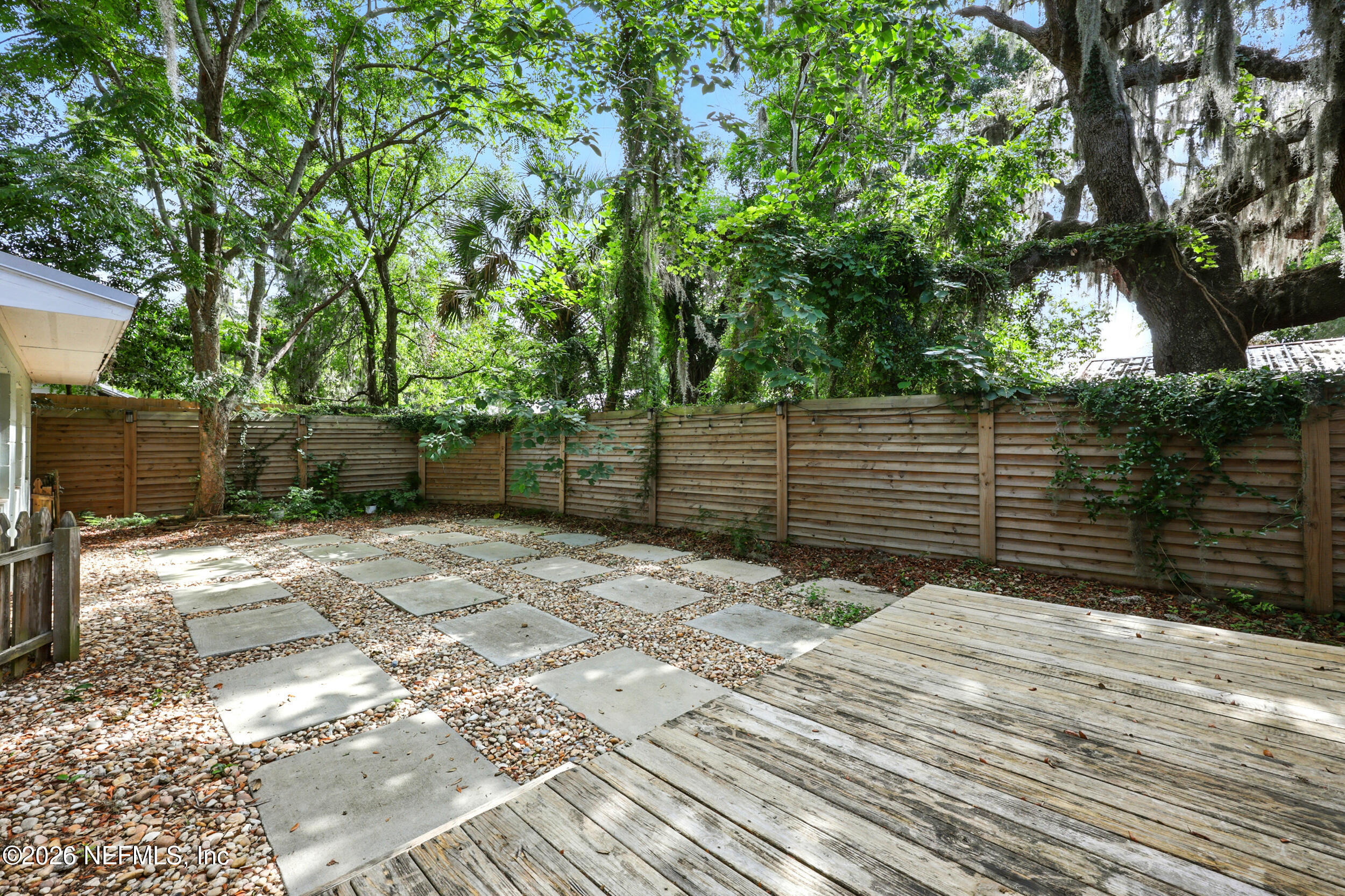 22 Marion Street St. Augustine, FL 32084 - Photo 21 of 23 a backyard of a house with lots of green space