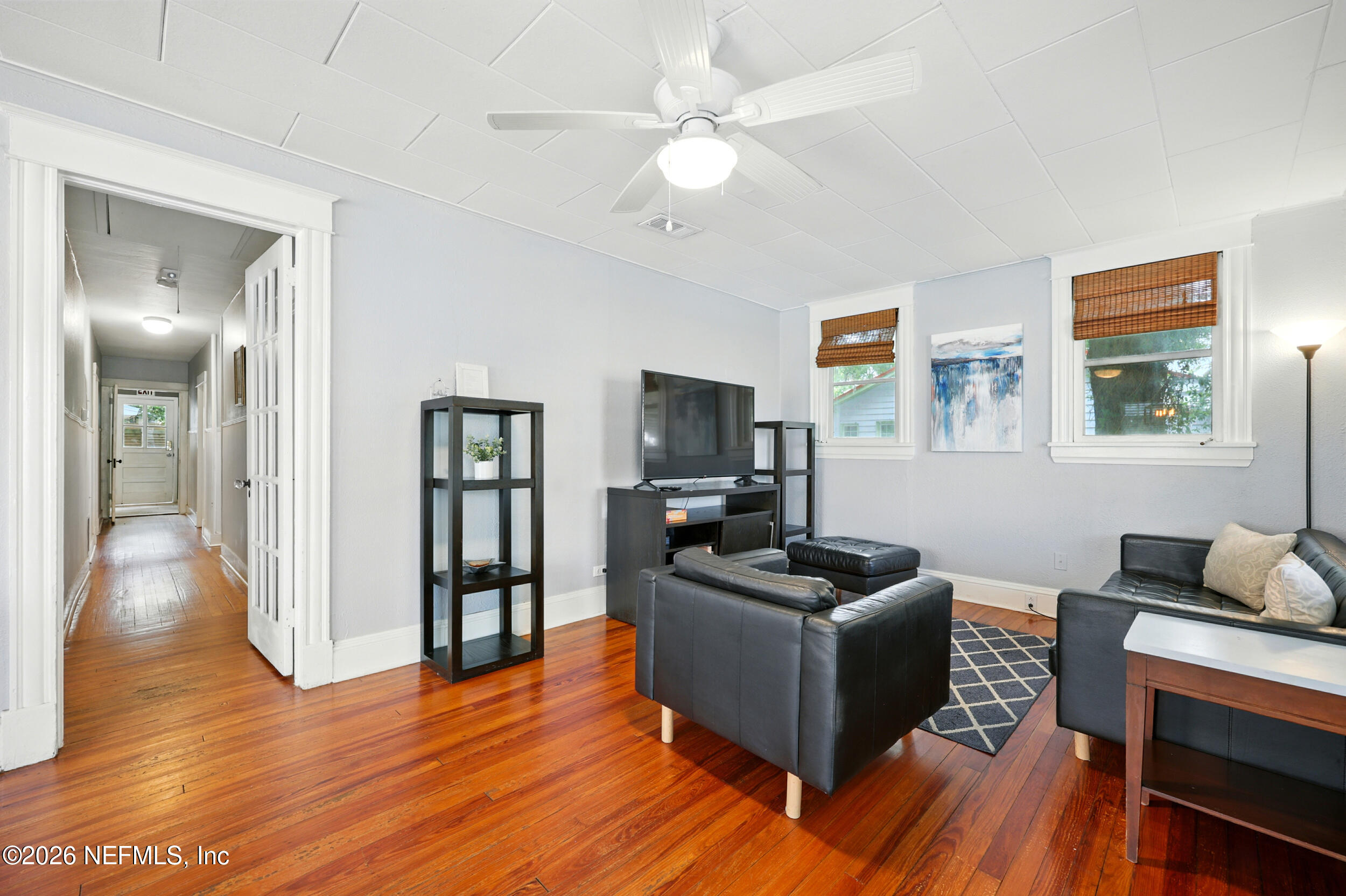 22 Marion Street St. Augustine, FL 32084 - Photo 5 of 23 a living room with furniture and a flat screen tv