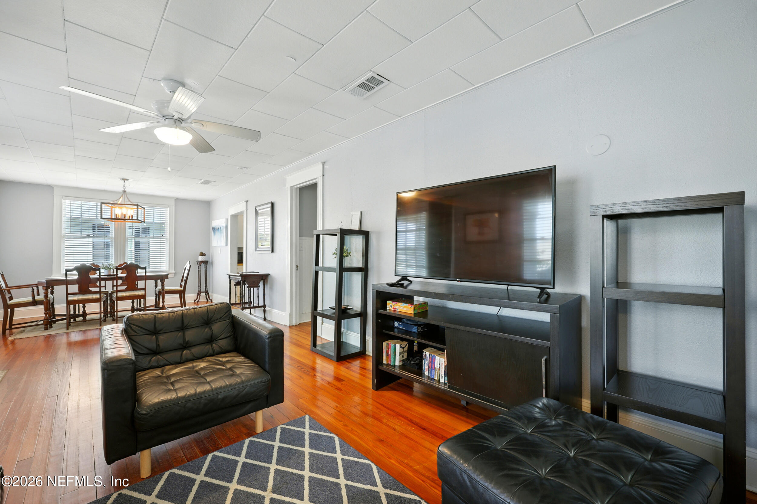 22 Marion Street St. Augustine, FL 32084 - Photo 7 of 23 a living room with furniture and a flat screen tv