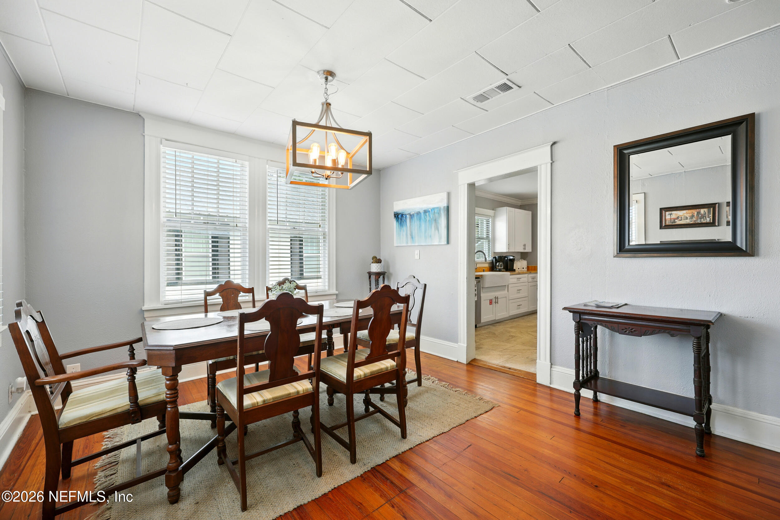 22 Marion Street St. Augustine, FL 32084 - Photo 8 of 23 a view of a dining room with furniture window and wooden floor