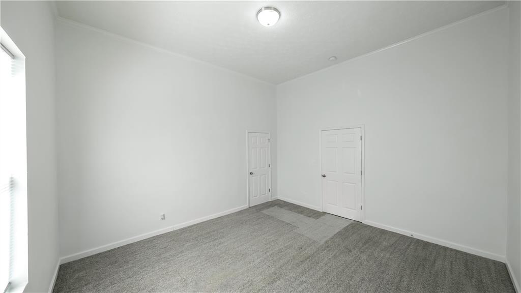 75 Rose Street Tallapoosa, GA 30176 - Photo 24 of 33 an empty room with a window