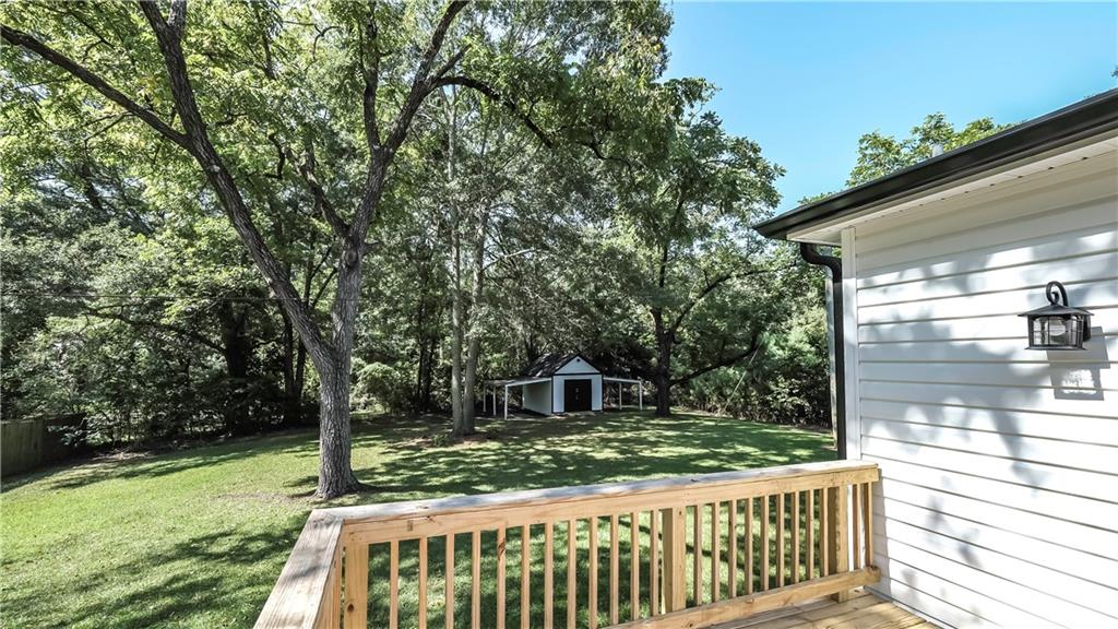 75 Rose Street Tallapoosa, GA 30176 - Photo 29 of 33 a view of a porch with a yard