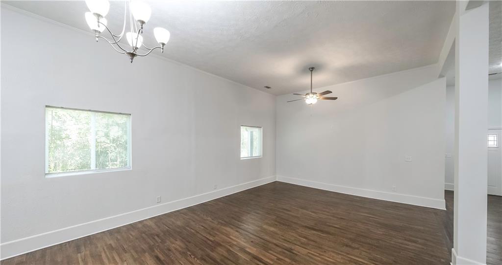 75 Rose Street Tallapoosa, GA 30176 - Photo 7 of 33 a view of empty room with wooden floor
