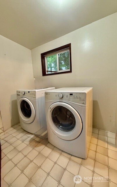 2002 200th Lane Ocean Park, WA 98640 - Photo 20 of 22 a utility room with dryer and washer