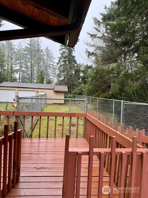 2002 200th Lane Ocean Park, WA 98640 - Photo 4 of 22 a view of deck with mountain and wooden floor
