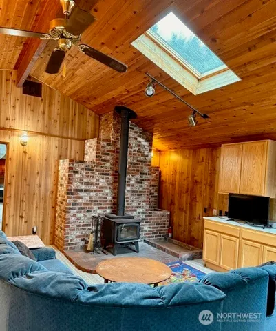 a view of swimming pool with seating area