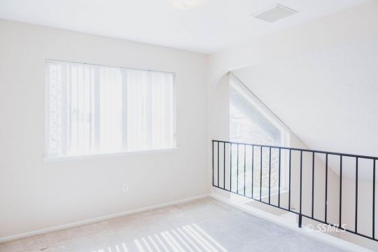 712 Peg Street Ridgecrest, CA 93555 - Photo 26 of 44 a view of an empty room with a window