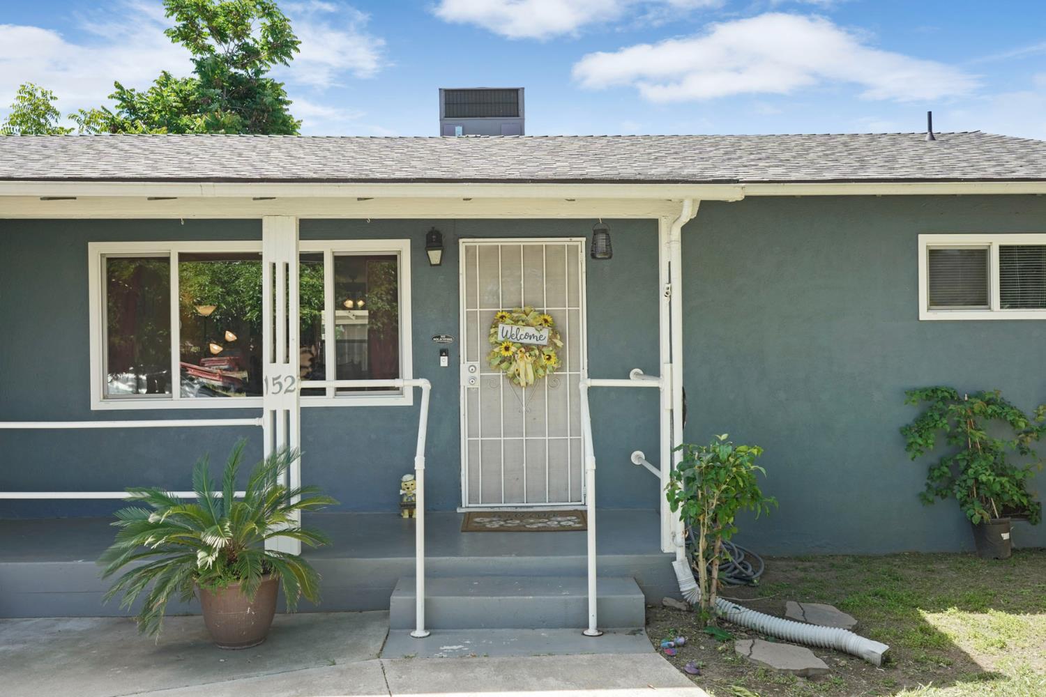 152 Drake Avenue Modesto, CA 95350 - Photo 5 of 52 a front view of a house