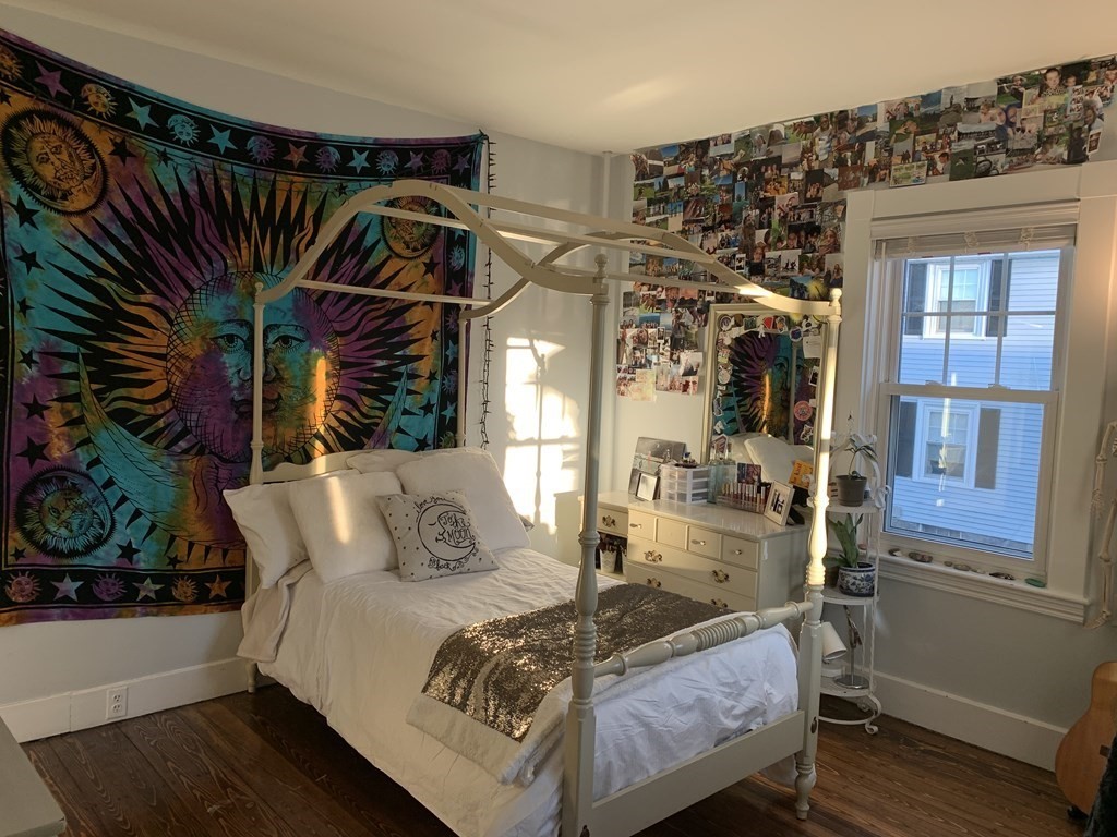 93 Waldeck Road Milton, MA 02186 - Photo 16 of 30 a bedroom with a bed and a window