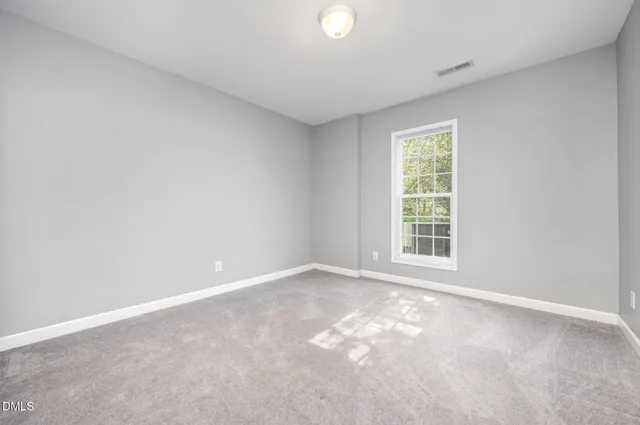 a picture of a bench in a white building