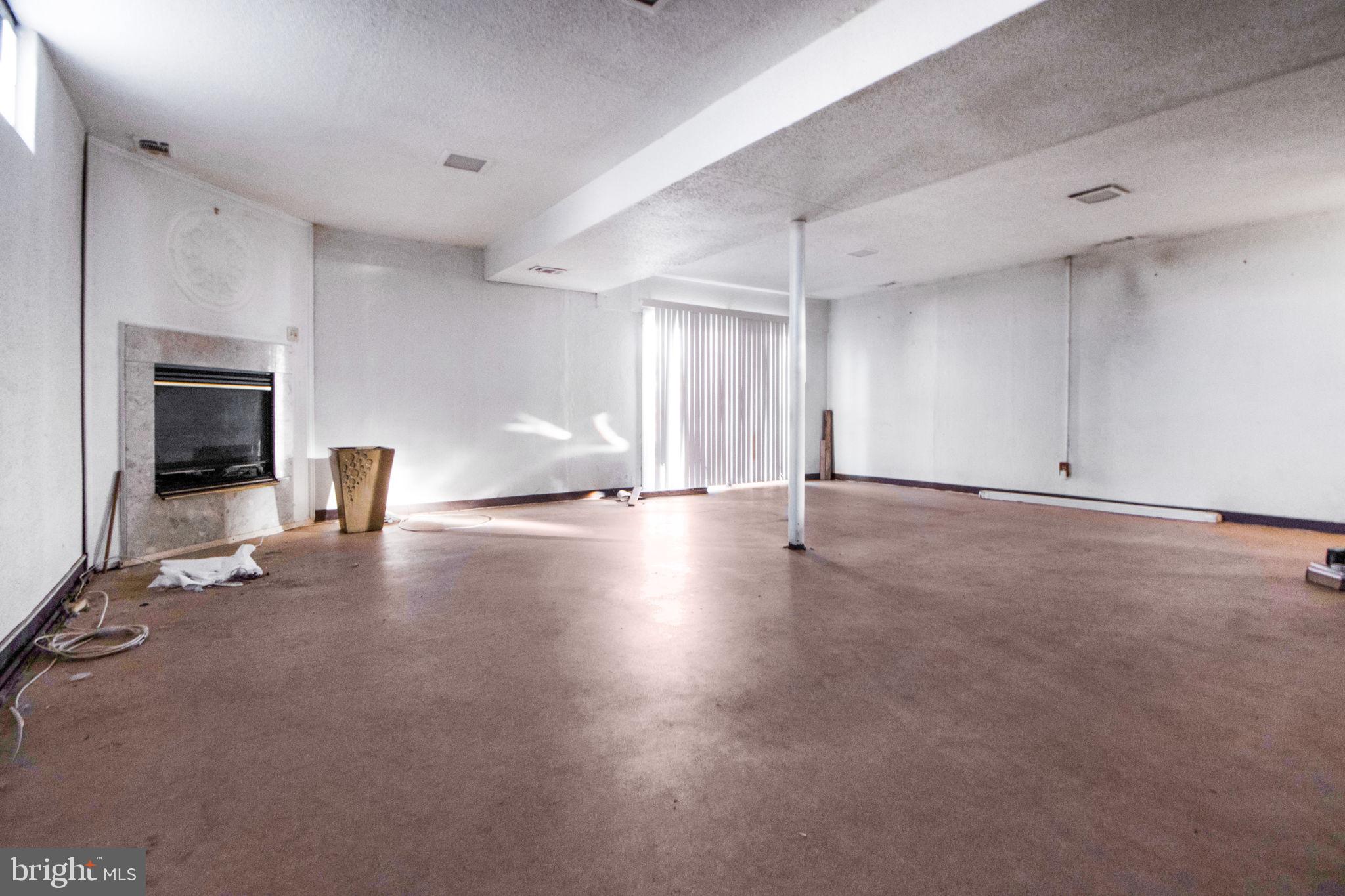 4610 Talman Road Pikesville, MD 21208 - Photo 24 of 30 Lower Level Recreation Room w Fireplace