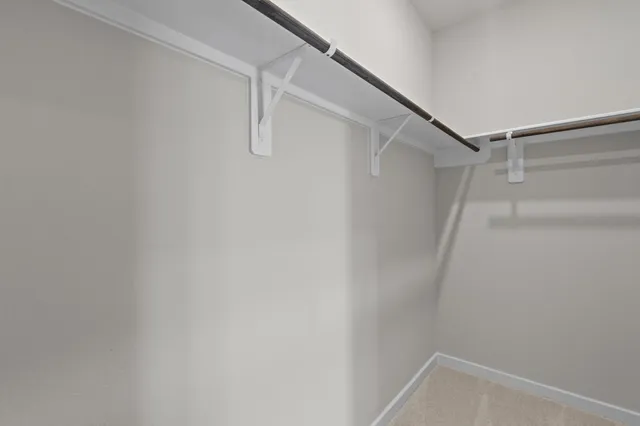 a view of a room with racks on the wall