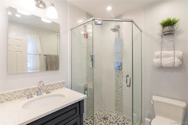 a bedroom with a bed and a closet