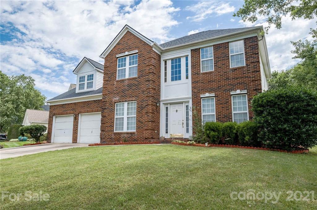 2331 Pimpernel Road Charlotte, NC 28213 - Photo 2 of 30 a front view of a house with garden