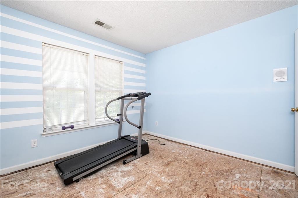 2331 Pimpernel Road Charlotte, NC 28213 - Photo 24 of 30 a view of a room with gym equipment